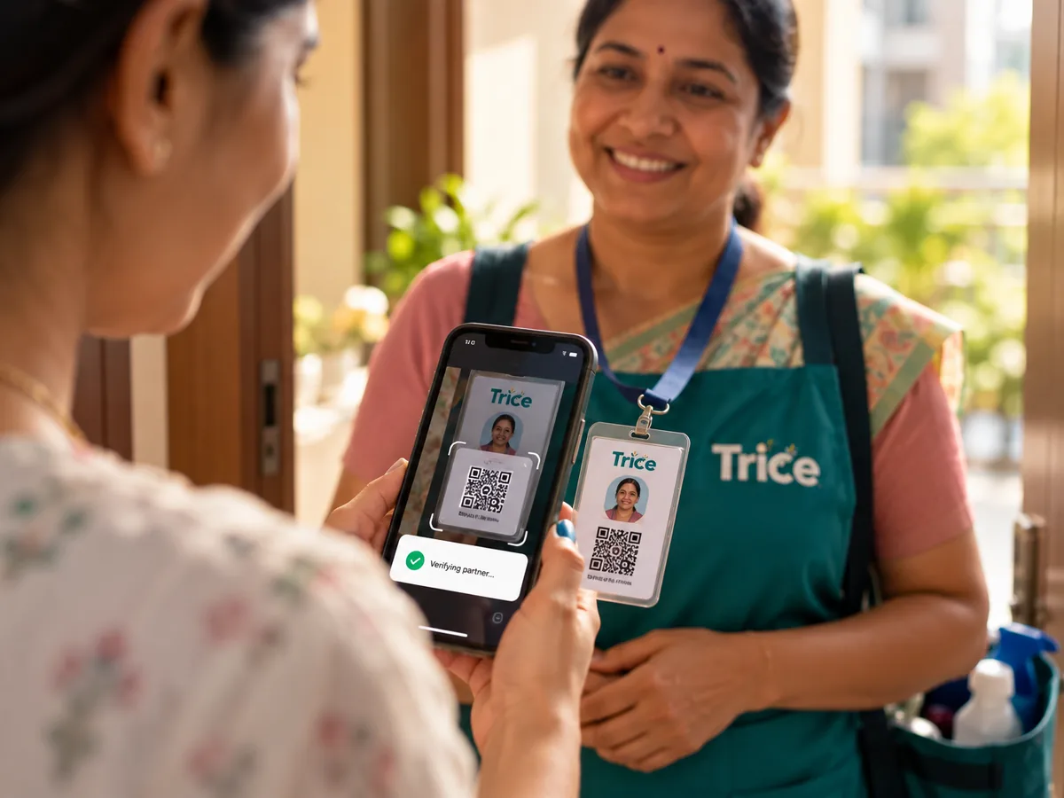 A homeowner scanning the QR code on a Trice partner's photo ID badge at the door
